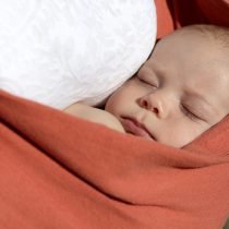 Sleeping baby in orange sling – Birth, Baby & You – Dee Bell – Lactation Consultant for Kent, Surrey & Sussex